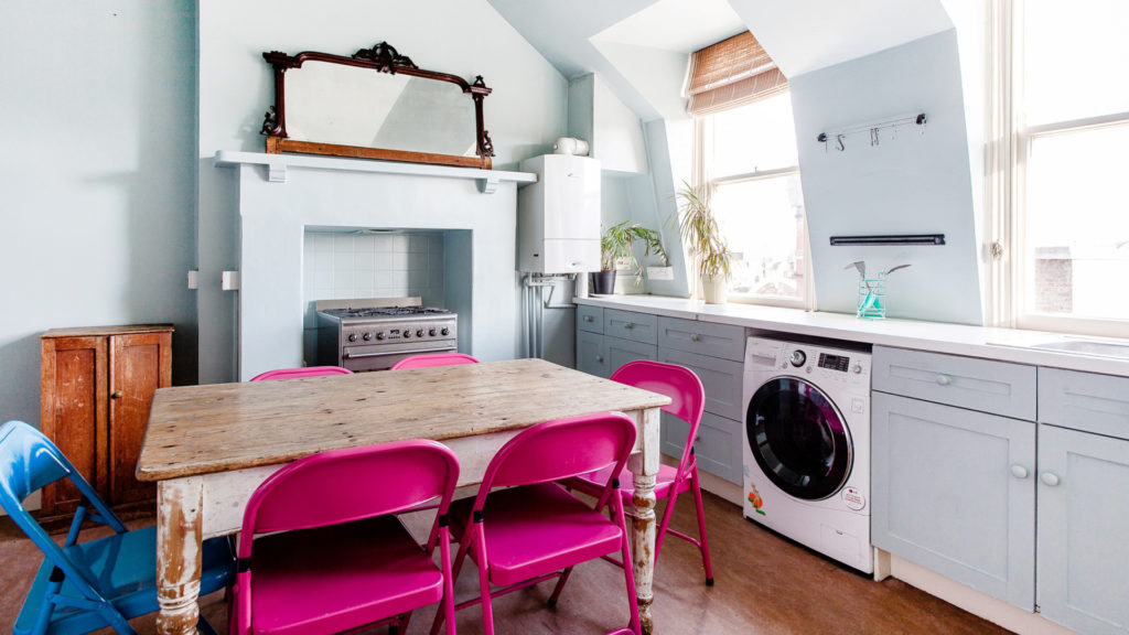 Outlet Residential London flat with pink chairs