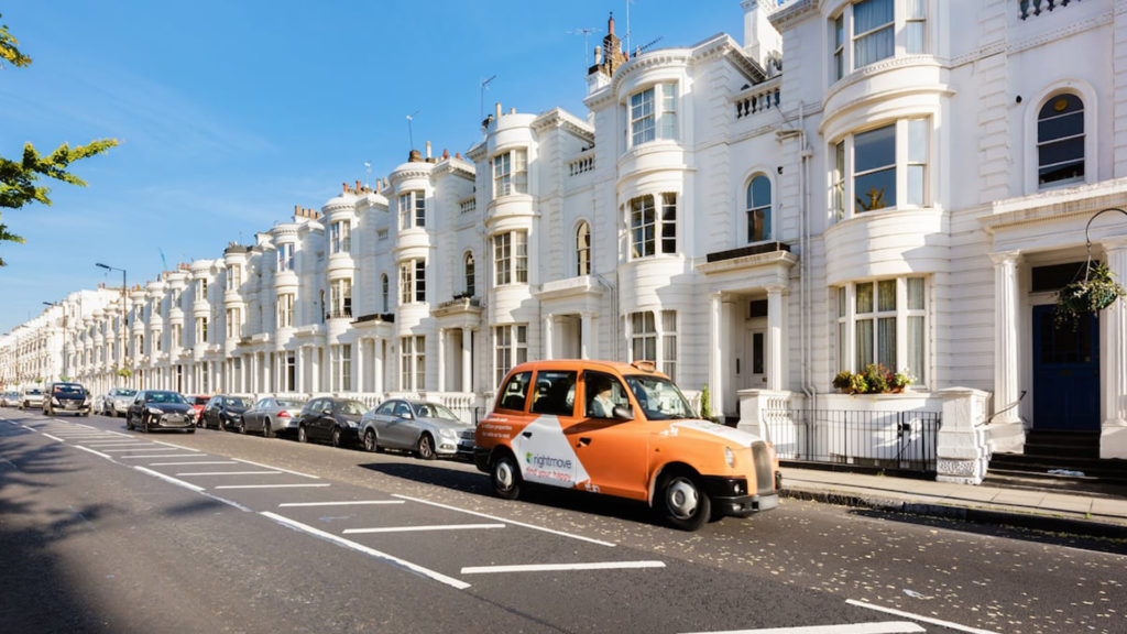 Outlet Residential London street with houses and taxi